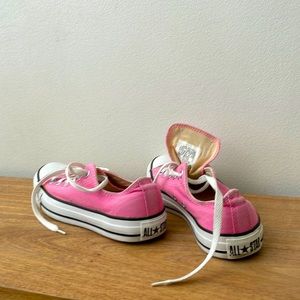 Pink Converse low tops